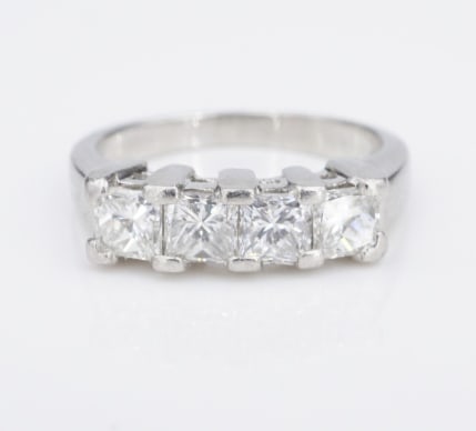 Platinum 1.1 ct Diamond Anniversary Band Stackable Ring Sz 4.25 Princess RG4589: This gorgeous anniversary band features a row of 4 beautiful natural princess cut diamonds set with shared bar prongs in the solid platinum band. Perfect as a wedding or anniversary band. It is also a