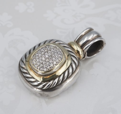 David Yurman 2-Tone Albion Diamond Enhancer Pendant Sterling Silver 18k PS2274: This beautiful enhancer pendant from David Yurman features a 18k yellow gold dome set with natural pave set diamonds and framed by a classic twisted cable design crafted in sterling silver. The sculpt