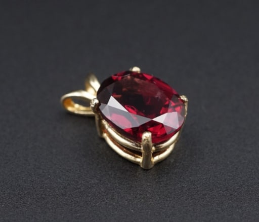 Vintage 14k Yellow Gold Red Garnet Pendant 0.53" Natural Oval Classic PG1982: This amazing vintage pendant features a large, oval-cut garnet prong set in a luxe 14k yellow gold mount. A classic, versatile piece that is sure to make a statement! Metal Type: 14k Yellow Gold Notab