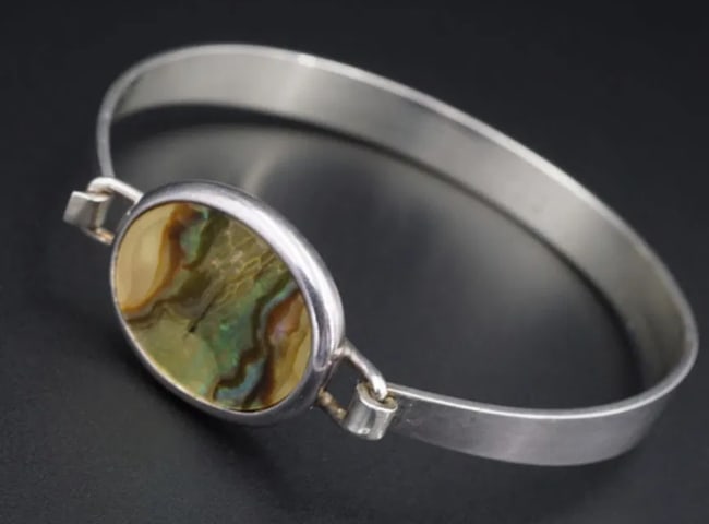 Denmark Arne Johansen Sterling Silver Abalone Hook Bangle Bracelet 6.5" BS2759: This beautiful Danish bracelet features an abalone station set atop a polished flat bangle. It secures with a hook-on clasp. This unique statement bracelet is eye catching enough to wear alone or coul