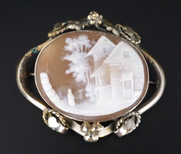 Unique Sterling Silver Carved Shell House Scene Cameo Pendant Brooch 2" OS631: This gorgeous carved shell cameo brooch is a wonderful estate find! It features a woman standing outside a detailed house. The shell is in a high relief setting with a gorgeous sterling silver open fl