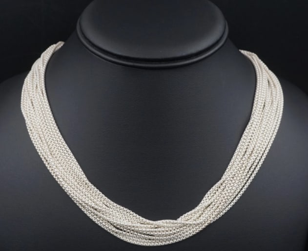 Christofle Madison Necklace Multi Strand Chain Strand Sterling Silver 18" NS2237: This designer multi-strand necklace from Christofle has layers of supple rounded box chain creating a fun display of movement when worn. It clasps securely with a wide foldover clasp. A beautiful stat