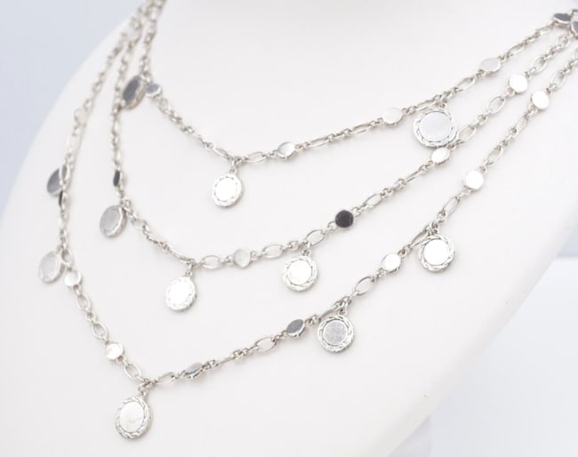 John Hardy Dot Collection Bib Necklace Sterling Silver Triple Row 18" NS1815: This designer necklace from John Hardy's Dot collection has a triple row construction featuring oval and dot link chains with dot dangles on each row, creating a fun display of movement when worn. The