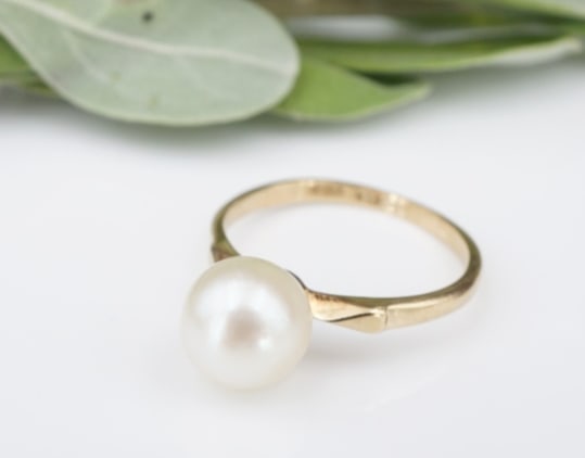 Vintage Mikimoto Pearl Ring 14k Gold Solitaire Stackable Size 3 7mm RG3843: This delicate designer Mikimoto ring features a lustrous pearl set atop a slim solid 14k yellow gold band. A classic design that has withstood the test of time. This ring would make a great addition t