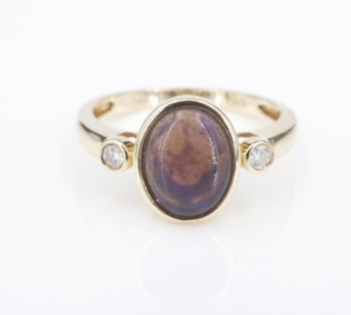 Vintage Opal Diamond 3-Stone Bezel Cocktail Ring 10k Yellow Gold Size 6 RG4754: This beautiful ring features a purple opal accented with sparkling white diamonds on both sides in a 3-stone bezel set design. All crafted in luxe yellow gold. The stunning color contrast gives this r