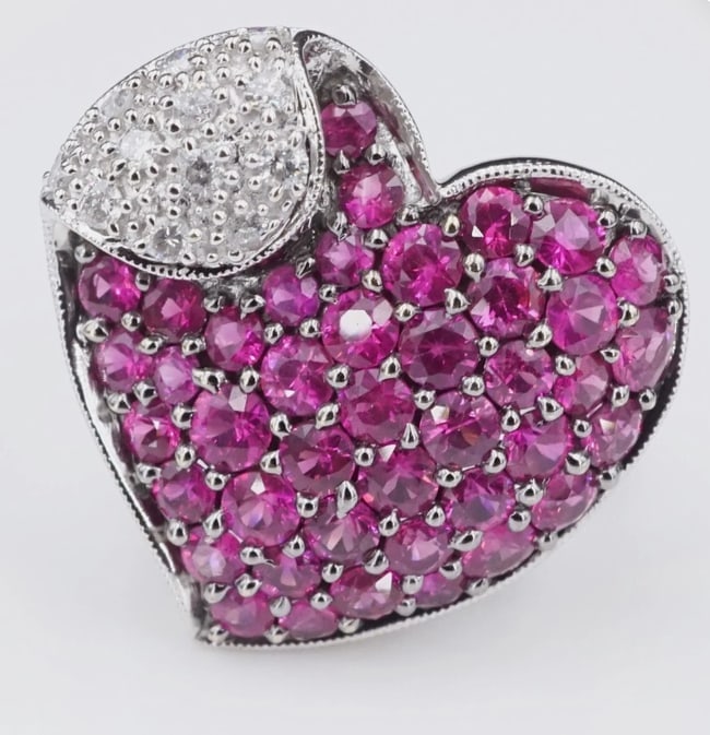 Samuel B. 14k White Gold Pave Ruby Diamond Heart Cocktail Ring Sz 5.5 RG3743: This beautiful ring from New York designer Samuel Benham features a three dimensional heart studded with hot pink pave rubies bead and accented with a corner swirl of diamonds. The pink and gold provi