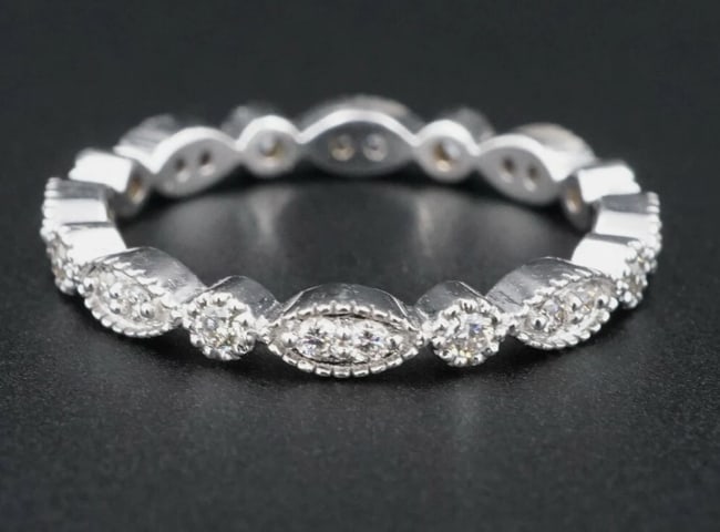 NWOT Scalloped 14k White Gold 1/2 ct Diamond Eternity Band Ring Size 5 RG3188A: This dainty and modern ring features a single band with alternating marquise and round scalloped edges, adorned with sparkling diamonds and milgrain detail. The perfect stackable ring with a modern sp