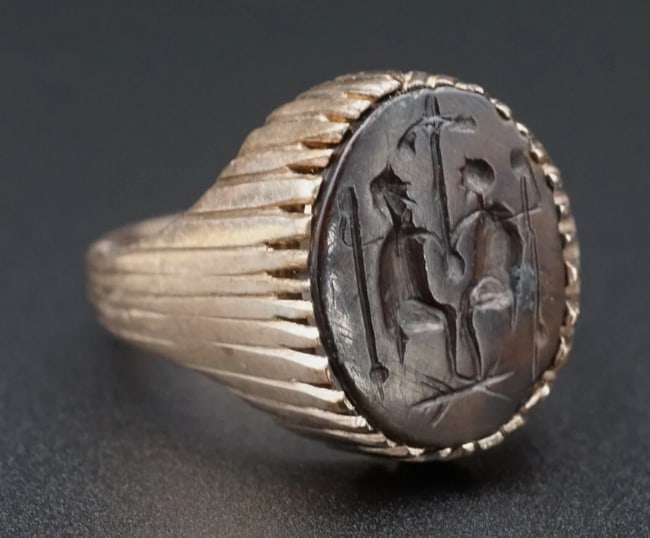 Antique 9K Yellow Gold Ancient Byzantine Intaglio Cross Ring Size 8.25 RG3177: This estate ring features an ancient Byzantine carnelian intaglio, set in solid 9k yellow gold. The carving resembles two figures with staffs with a crucifix in the distance. The combination of gold a