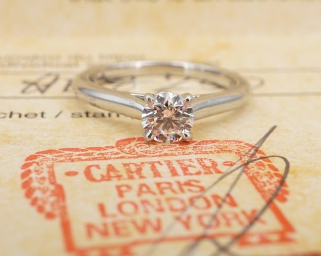 Cartier Diamond Platinum Engagement Ring Solitaire 0.45ct Size 5.25 GIA RG4906: This engagement ring, from Cartier, features a beautiful round brilliant-cut diamond solitaire, prong-set in a solid platinum setting with a luxe polished construction. A classic beauty, highlighted b