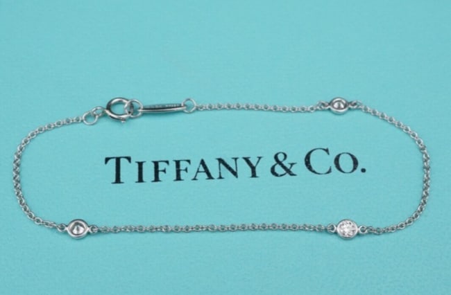 Tiffany & Co. Peretti Diamond DBTY Bracelet Platinum 6.5" BG985: This adorable Tiffany & Co. bracelet by designer Elsa Peretti features bezel set diamonds set on a sturdy cable link chain. Set in solid platinum, this piece is amazing on its own or layered with your