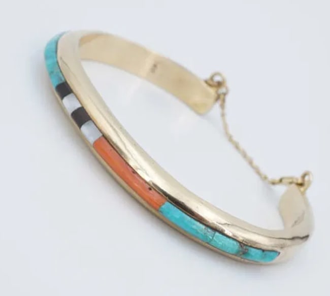 Navajo Jimmy King Jr 14k Yellow Gold Coral Turquoise Cuff Bracelet 6.25" BG1071: This lovely cuff bracelet features a linear turquoise stonework set in solid yellow gold. The handcrafted gold work is alluring patterns of mix stones. This one-of-a-kind statement piece will be a gre