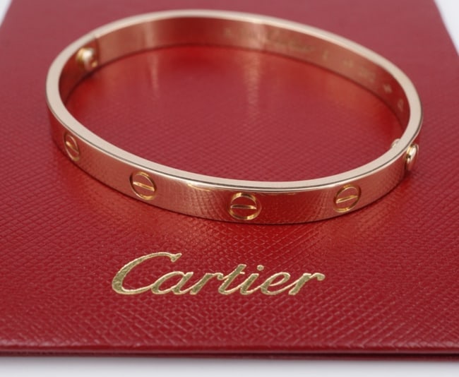 Cartier Love Bracelet 18k Pink Rose Gold Size 16 Box Cert BG955: From the "Love" collection, this classic Cartier bangle is crafted of solid 18k rose gold. Original screw system. A perfect gift for yourself or someone you love. Metal Type: 18k Rose Gold Notable Mar