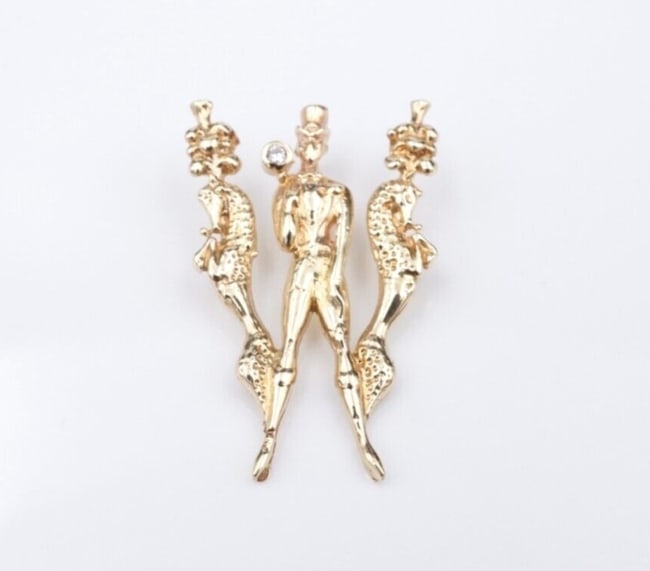 Erte Alphabet Series Letter "W" 14k Yellow Gold CFA Pendant 1.2" PG1868: Description: This beautiful pendant from Erte's Alphabet Series features a figure in ringmaster attire adorned with staff bordered by two, upright horses wearing extravagant headpieces all forming the