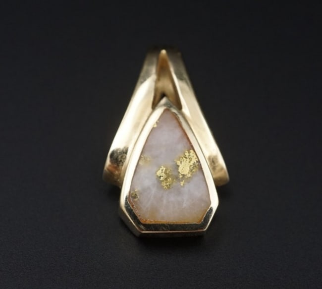14k Yellow Vintage Alaskan Gold Quartz Vein Pendant 1" Gold Rush PG2051: This beautiful piece features a triangular quartz with gold gemstone framed in 14k yellow gold. A bold look, perfect for any collector of raw gold jewelry. Metal Type: 14k Yellow Gold tested via Kee. 