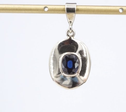 Vintage 14k 1ct Blue Sapphire Pendant White Gold Charm 1" Natural Oval PG1992: This luxe pendant features a vivid blue natural oval cut sapphire bezel set atop an ovular 14k white gold frame. The large tapered bale allows this elegant piece to be worn on a variety of chains and 