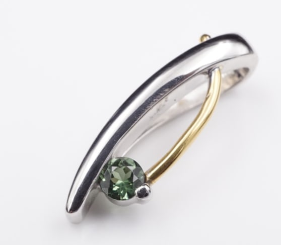 Designer Thibaudeau Platinum 24k Gold Green Tourmaline Modern Pendant 1" PG787: This luxe pendant from ultra designer Claude Thibaudeau has a modernist look. Featuring a green tourmaline set in solid platinum with a pure 24k gold curved accent. A unique piece sure to draw complem