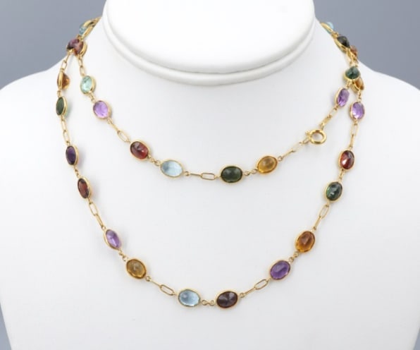 18k Bezel Set Mixed Gem Station Necklace 28" Yellow Gold 40ct NG1816: This beautiful necklace features 40 carats of assorted natural gems, bezel set and evenly spaced on a supple 18k yellow gold chain. A versatile piece you can wear dressed up in a little black dress, o