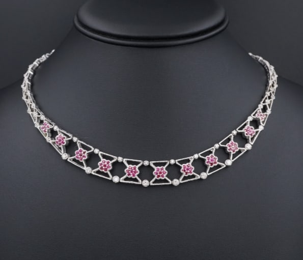 Vintage 14k White Gold Diamond Ruby Necklace 16" Collar Floral 3ctw NG1583: This gorgeous and luxe collar showcases designer quality and style with sparkling diamonds and deep red rubies set in a luxurious lacy floral design. Each section is articulated, giving this stunning 