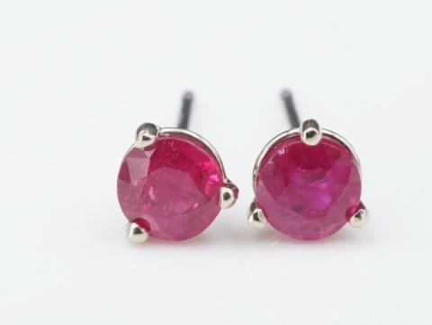 14k White Gold Natural Ruby Stud Earrings Round 2/3 Carat EG1694: This classic pair of earrings feature beautiful rubies set in solid 14k white gold three-prong martini baskets. The earrings fasten securely with 14k white gold butterfly backs as pictured. A classic 