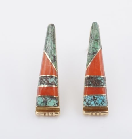 14k Navajo Inlay Earrings Turquoise Coral Yellow Gold Danny Clark Signed EG2512: These lovely pair of earrings from Navajo artisan Danny Clark feature a geometric inlay of turquoise and red coral, bezel-set in a triangular frame. Crafted in solid 14k yellow gold, these earrings ar