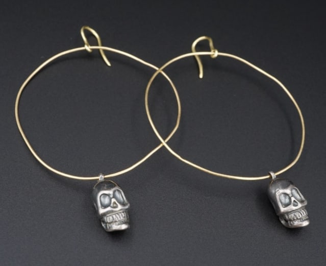 18k Yellow Gold Hoop Earrings 3" Skull Halloween Sterling Silver Spooky EG2117: These luxe earrings each feature a large 18k yellow gold hoop with a detailed sterling silver skull charm dangling below. The earrings secure with sturdy hooks for pierced ears. These statement earrin
