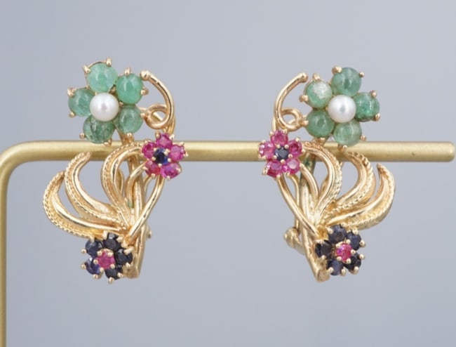 14k Natural Sapphire Ruby Pearl Huggie Earrings Classic Tutti Frutti EG2750: This lovely pair of mid-century tutti frutti earrings feature a floral motif set in 14k yellow gold. Embellished with emeralds, ruby and sapphire, these earrings are a gorgeous addition to any jewelry