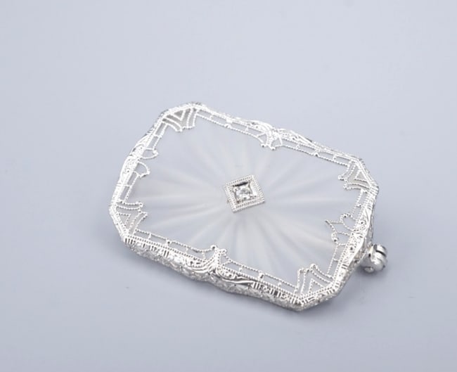 Antique 14k Diamond Camphor Glass Brooch Pin White Gold 1.25" Filigree OG554: This gorgeous antique brooch features frosted camphor glass embellished with a quaint diamond accent at center and a beautiful white gold filigree design around the border. Crafted of solid 14k white 