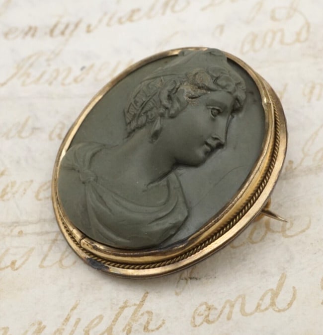 Antique Georgian Ceres Lava Stone Carved Cameo Gold Brooch Pin OS667: This interesting cameo features an oval stone with a high relief carving, bezel set in yellow gold and is likely a souvenir from the the site of Pompei. After the rediscovery of the city in the early 