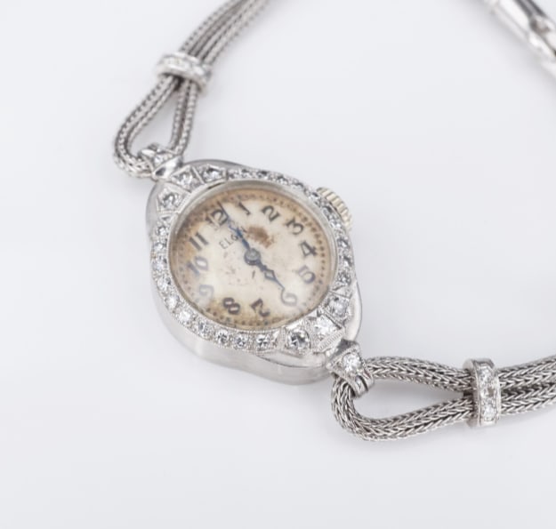 Vintage Ladies Platinum Diamond Elgin Watch 4.5" 17.5mm W759: This stunning Elgin watch features a sparkling diamond bezel crafted of solid platinum. The petite stainless mesh strap features a platinum and diamond clasp with additional diamond stations. A gorgeo