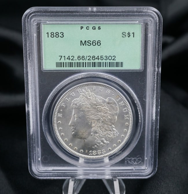 1883 Morgan $1 Silver Dollar Coin PCGS Sealed Uncirculated MS66 CN950: This beautiful silver coin was minted in San Francisco in 1883. An amazing collectible coin that will only appreciate in value. Only 12,290,000 minted. Only 1208 graded MS66. Metal Type: 90% Silver Mi
