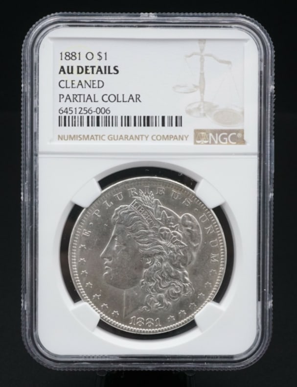 1881-O Morgan $1 Dollar Silver Dollar Coin NGC AU Partial Collar Error HCG CN307: Very sought after year. NGC certified. Partial collar error 1881 only 5,708,000 minted. Metal Type:90% Silver Stamps:Year- 1881 New Orleans Mint Measurements:N/A ConditionCleaned - AU details Jewelry 