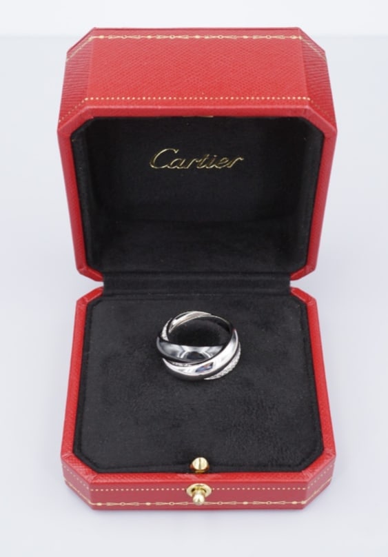 Cartier Pave Diamond Ceramic Trinity Rolling Band Ring 18k Size 51 LM CO1244: This stately ring features three interlocking bands of black ceramic, white gold, and pave diamond in white gold. This large model version is still sold by Cartier The trinity ring represents fidelity