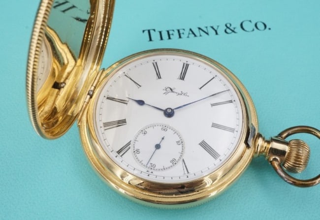 1920s Solid 18k Yellow Gold Tiffany & Co Pocket Watch New York Winds & Runs W817: Amazing pocket watch with a very rare case. Double hunter 18k yellow gold watch case with a minimalist pattern. Matching serial numbers Circa 1920s Metal Type: 18k Yellow Gold Notable Marks: Movement 