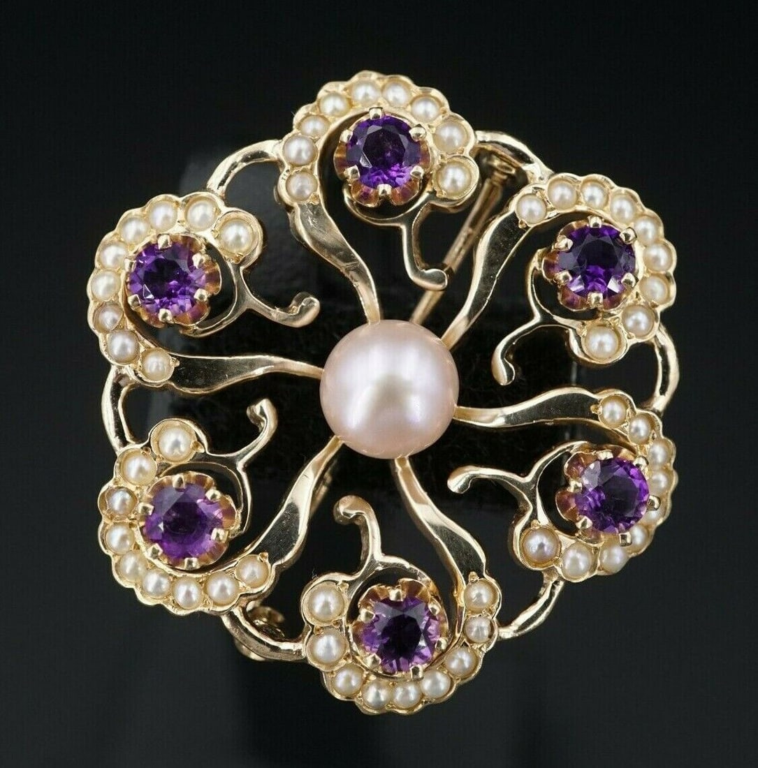 Vtg 14k Yellow Gold Amethyst Seed Pearl Sunburst Scroll Pin Brooch 1.4": This beautiful vintage piece features curls of seed pearls set in a scrolled halo pattern, with a lustrous at its center. All crafted of solid 14k yellow gold. A perfect piece for any collector of vin