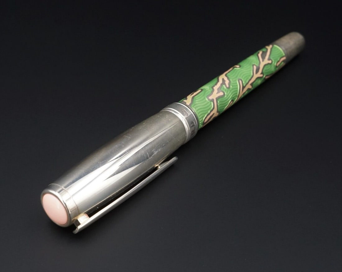 Chopard Sterling 18k Pink Coral Green Enamel Fountain Pen Limited Edition: Described as - "Hold the beauty of the coral reef in the palm of your hand with this limited-edition fountain pen from Chopard. Made of sterling silver, it's a sight to behold. The barrel is decorated