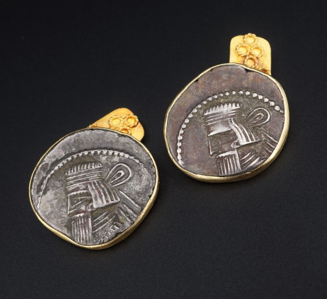 Luisa Del Valle 18k Gold Ancient Parthan Artabanus Silver Coin Cufflinks: This statement pair of designer cufflinks feature ancient silver drachm from the Parthian kingdom. Each coin features a depiction of Artabanus II set in 20k yellow gold with 18k ends. Metal Type: 18k 