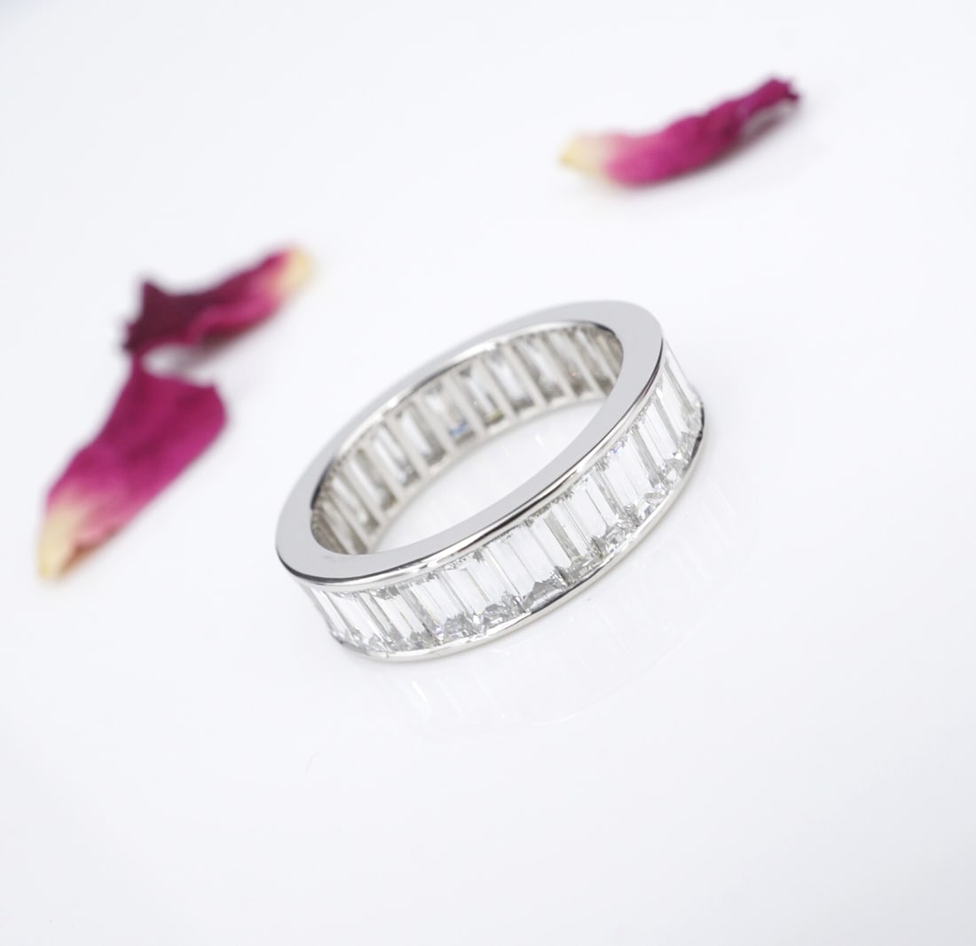 Platinum 5 ct Baguette Cut Diamond Eternity Band Ring Size 6 Anniversary: This luxe eternity band features a continuous ring of baguette-cut diamonds channel-set for a seamless look and sparkle from every angle. A gorgeous creation with all natural diamonds. This beautiful 