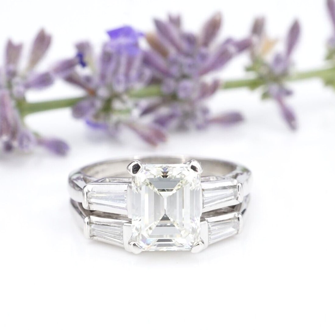 Platinum 2.5ct Emerald Cut GIA Diamond Engagement Ring Bridal Set Sz 5.25: This beautiful modern ring is a classic 3-stone design, featuring a large emerald cut diamond flanked by tapered baguettes. The accompanying band is contoured to fit snugly, echoing the design with tw