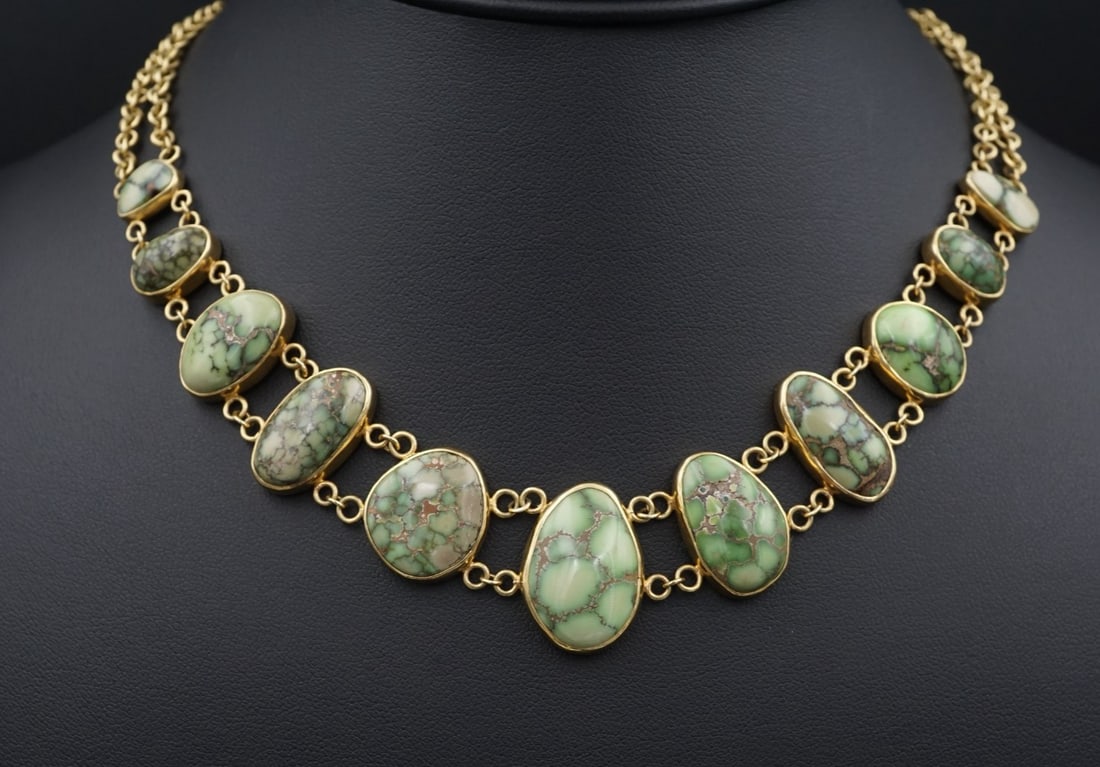 Santa Fe Damele Mine Turquoise Station Necklace 18k Gold 15" Signed MSM NG1768: Crafted of solid yellow gold, this rare necklace features eleven green Damele Mine turquoise stations designed by Santa Fe artist MSM. Each bezel set station is designed to lay perfectly on its wearer