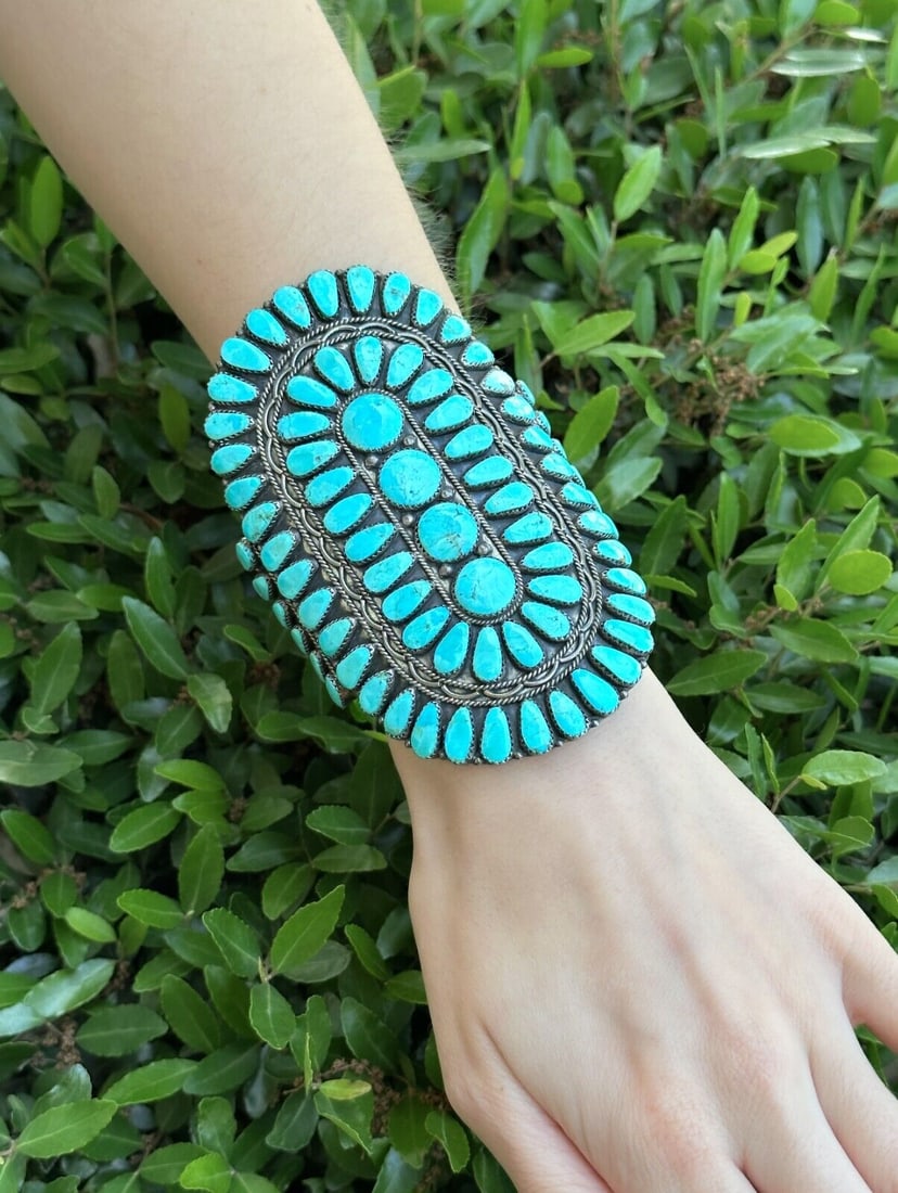 Larry Moses Begay Petit Point Turquoise Cuff Bracelet Sterling Silver 4" BS2898: This impressive Navajo cuff features a stunning petit point blue turquoise in circular patterns with rope and bead accents throughout. All crafted in solid sterling silver. A beautiful pop of color! C