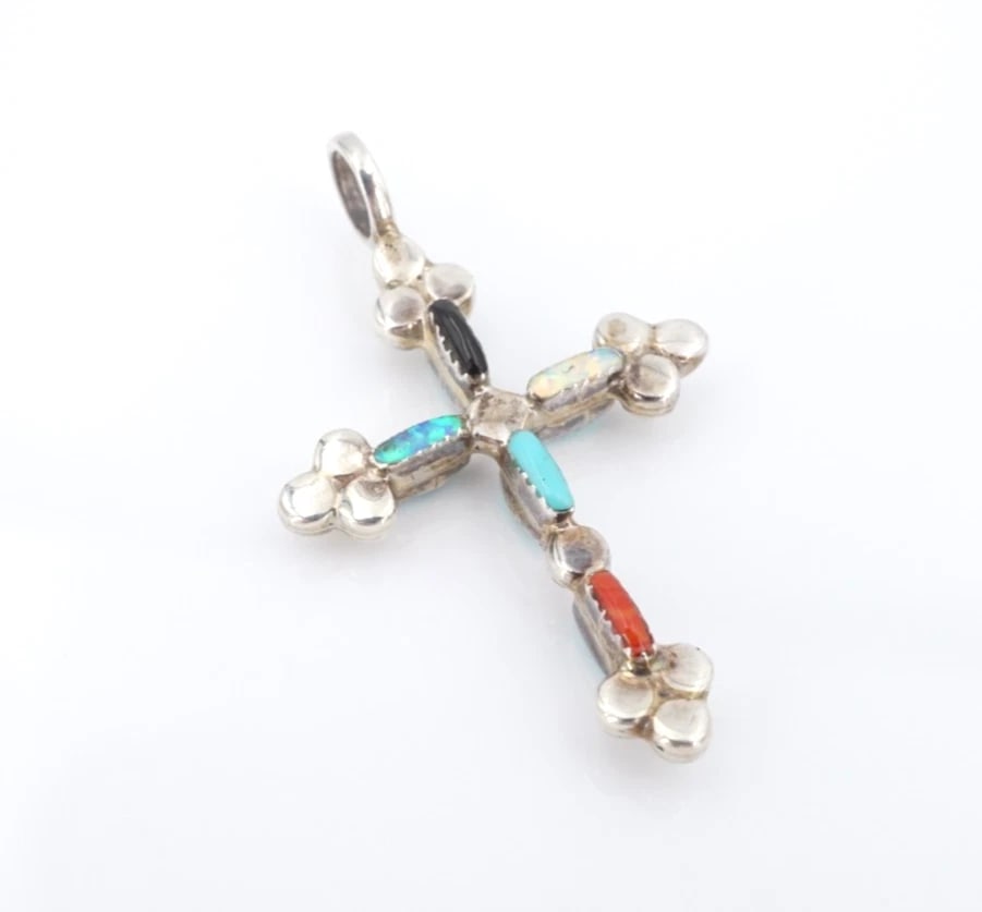 Southwestern Vintage Reversible Turquoise Cross Pendant Sterling Silver PS2341: This classic Southwestern artisan pendant features a beautiful botonee style cross pendant embellished with natural turquoise, onyx, opal and spiny oyster cabochons. With an all turquoise design on th