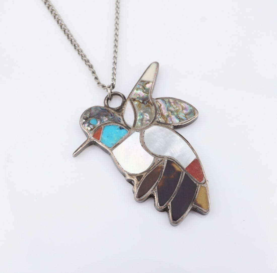 Zuni Hummingbird Pendant Necklace Sterling Stone Inlay Shack 18" Vintage NS2250: Hand crafted by Zuni artisans Bobby and Corraine Shack, this beautiful vintage necklace features a hummingbird pendant with inlaid sections of turquoise, coral, abalone, mother of pearl, and other mix