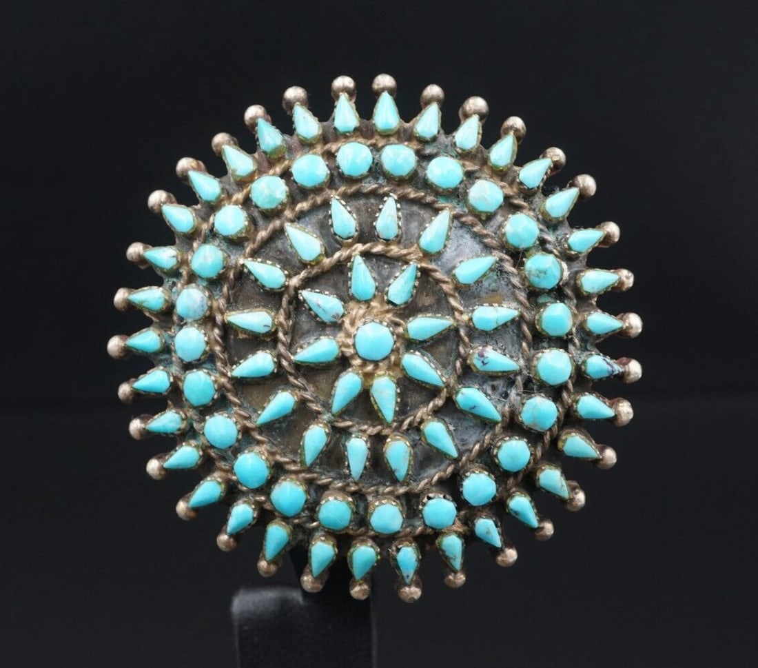 Vintage Zuni Turquoise Pendant Sterling Silver Reynesta Leland Artisan 2?? PS2072: This beautiful pendant is set with turquoise set in solid sterling silver. The stones are in wonderful shapes such as snake eye and teardrops. Situated throughout the stones are phenomenal silver work