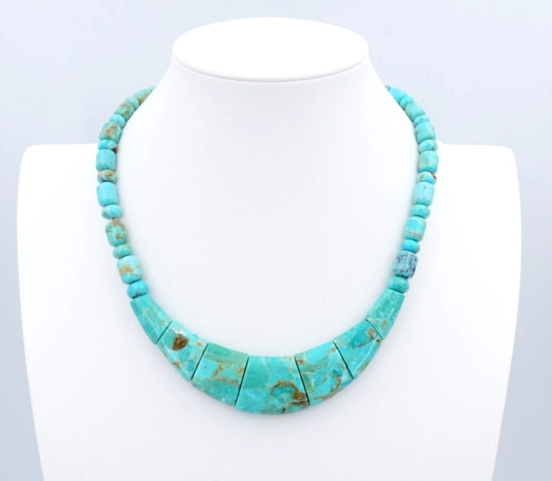 Jay King DRT Sterling Silver Graduated Blue Turquoise Bead Bib Necklace NS2482: This beautiful necklace from Mine Finds by Jay King features graduated turquoise front with beads alternating with alternating beads. Complete with a sterling silver hook closure, this gorgeous piece 