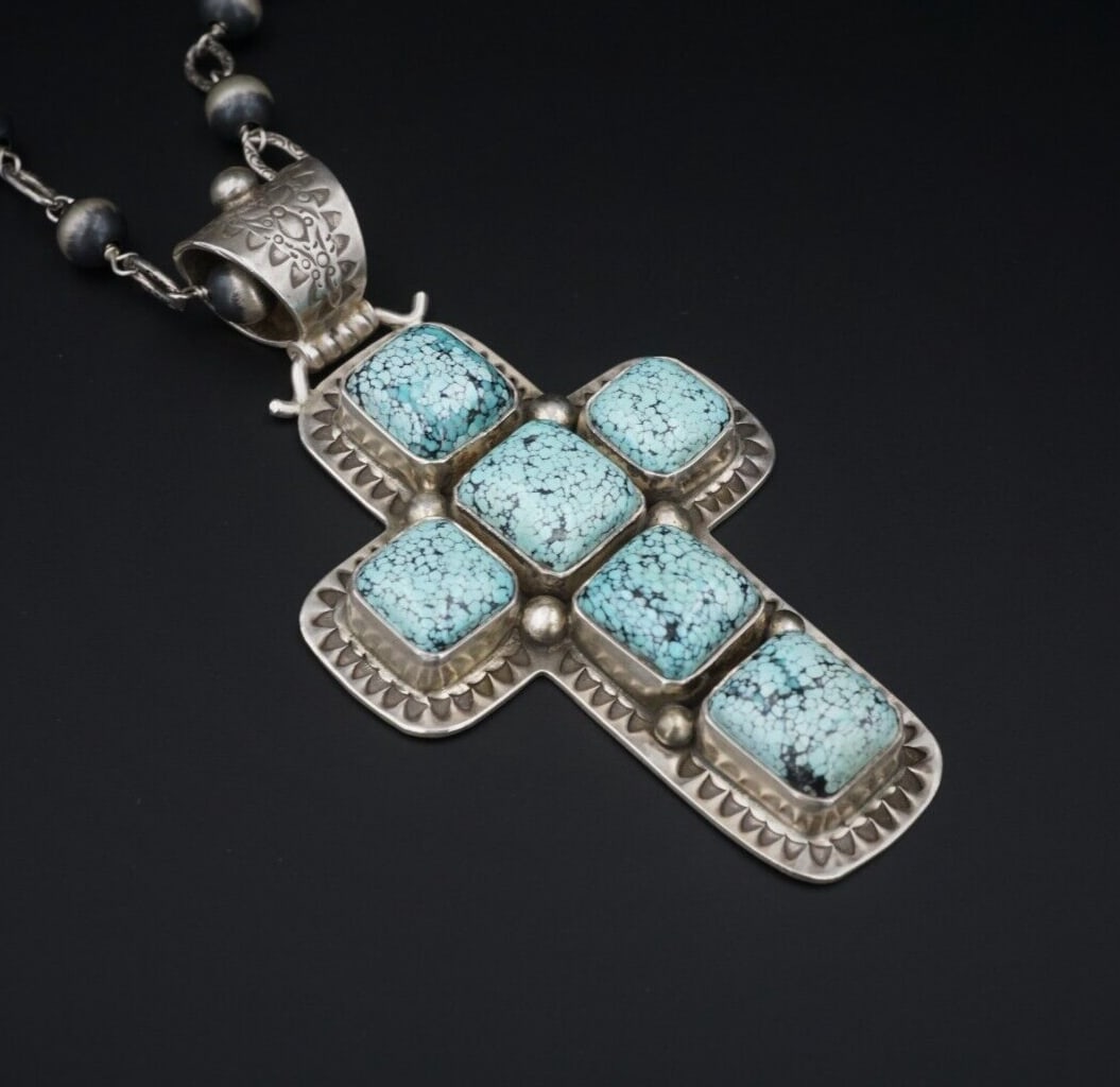 David Troutman Sterling Spiderweb Turquoise Cross Pendant Necklace 3.5" PS1975: This large carved Troutman cross pendant necklace features natural spiderweb turquoise cabochons bezel set with stamped details and bead accents, creating a bold look with depth and texture. The accom