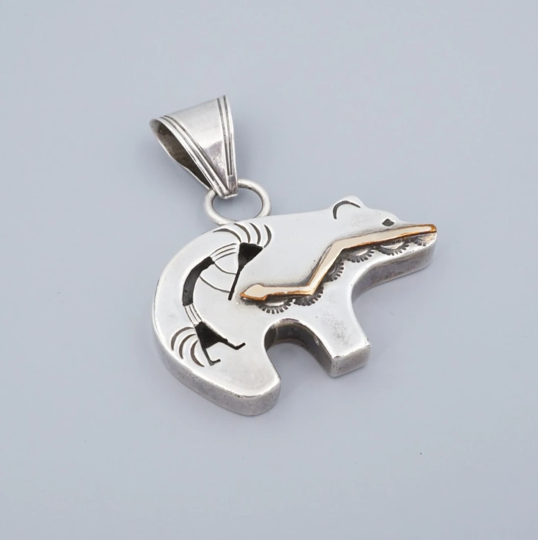 Southwestern 2-Tone Spirit Bear Pendant Kokopelli Sterling Silver 1.8" PS2360: This gorgeous Southwestern pendant features a puffy 3D spirit bear pendant with a cutout Kokopelli dancer motif and a gold tone arrow design on the face. Complete with hand stamped designs, this penda