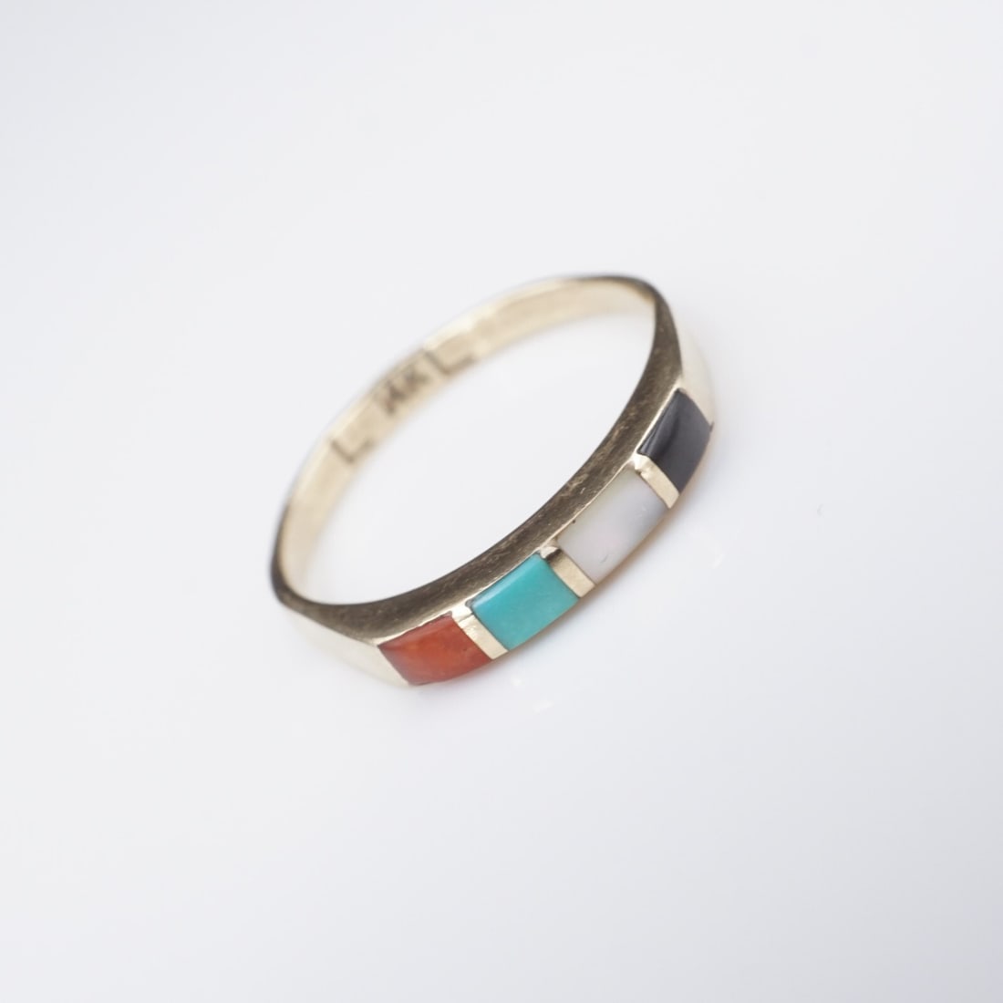14k Navajo Inlay Band Ring Yellow Gold Size 5 Vintage Turquoise Coral RG4483: This beautiful ring features inlaid turquoise, coral, mother of pearl, and onyx set flush in a solid 14k yellow gold band. This ring is the perfect gift for yourself or someone you love! Metal Type: 1