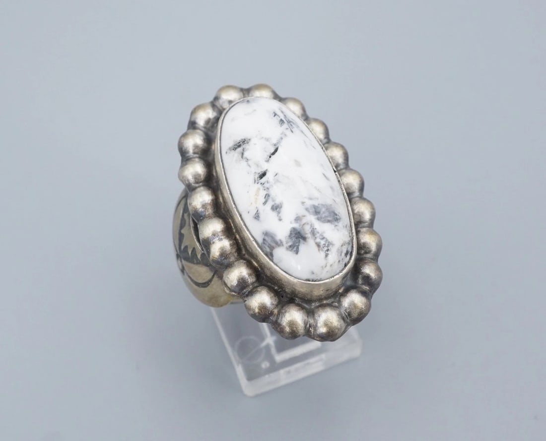 Paul Livingston White Buffalo Turquoise Ring Sterling Silver Sz 8 Navajo RS3839: This beautiful ring from Navajo artisan Paul Livingston features a gorgeous white buffalo turquoise cabochon bezel atop a wide triple-split shank sterling silver band with bead accents. Complete with 