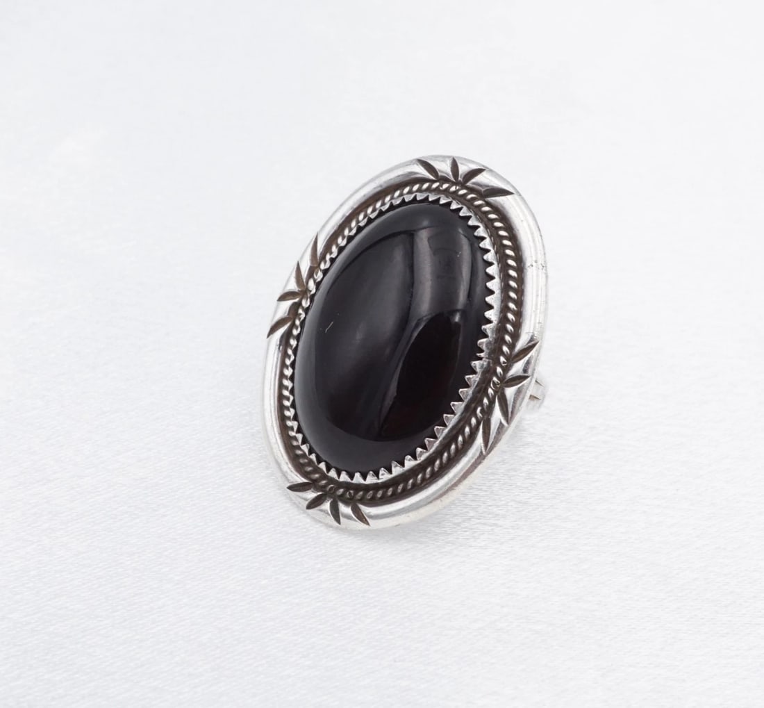 Navajo Sterling Silver Onyx Ring Size 4.75 Vintage Artisan 1.3" Estate RS3939: This vintage artisan ring features a large oval onyx cabochon set in a sawtooth bezel. Hand stamped details frame the face, adding to the depth and beauty of the ring. All set in solid sterling silver