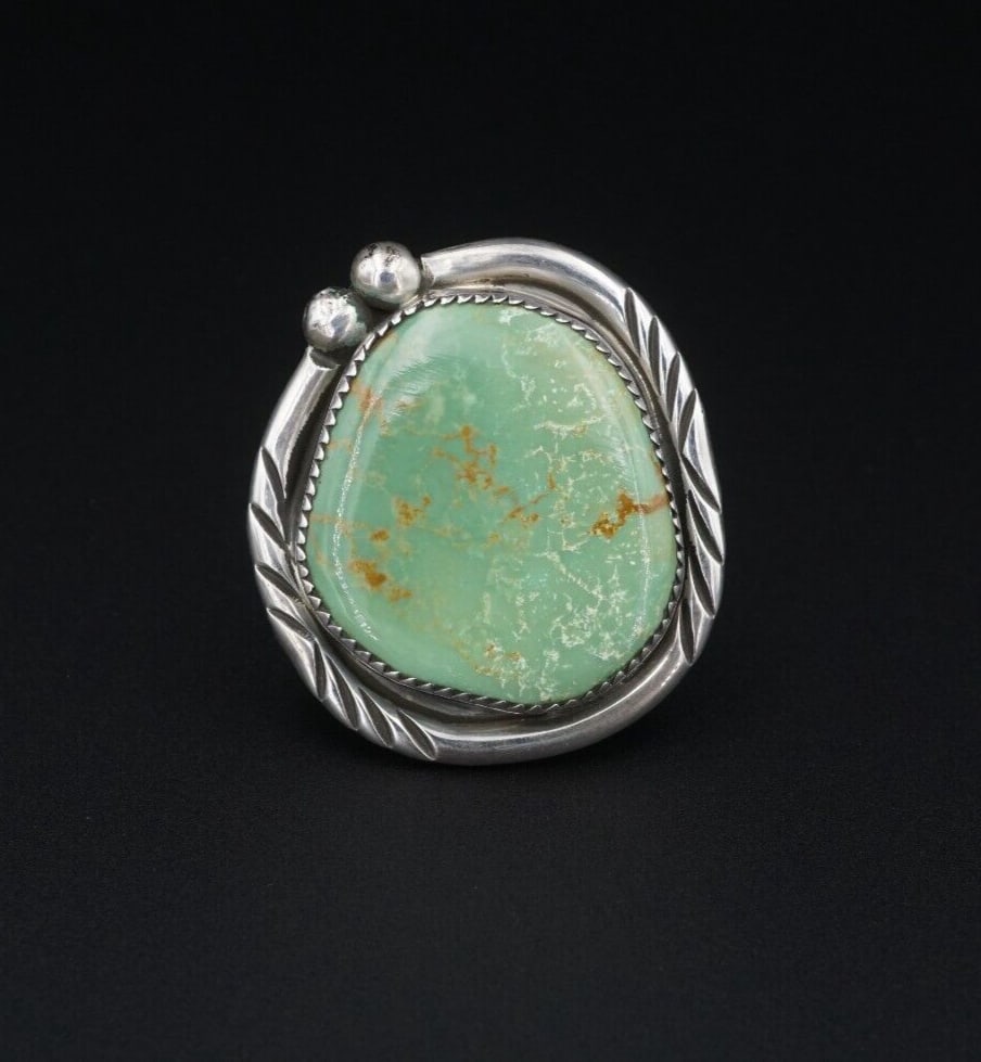 Vintage Navajo Turquoise Ring Sterling Silver Slab Green Size 12.5 1.5" RS3612: This beautiful Navajo ring features a gorgeous slab of green turquoise, set in a classic sawtooth bezel with a hand-stamped border embellished with silver beads. A great addition to any Native America